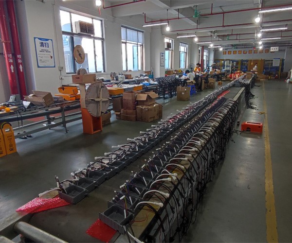 Parking flap lock assembly Parking flap lock assembly